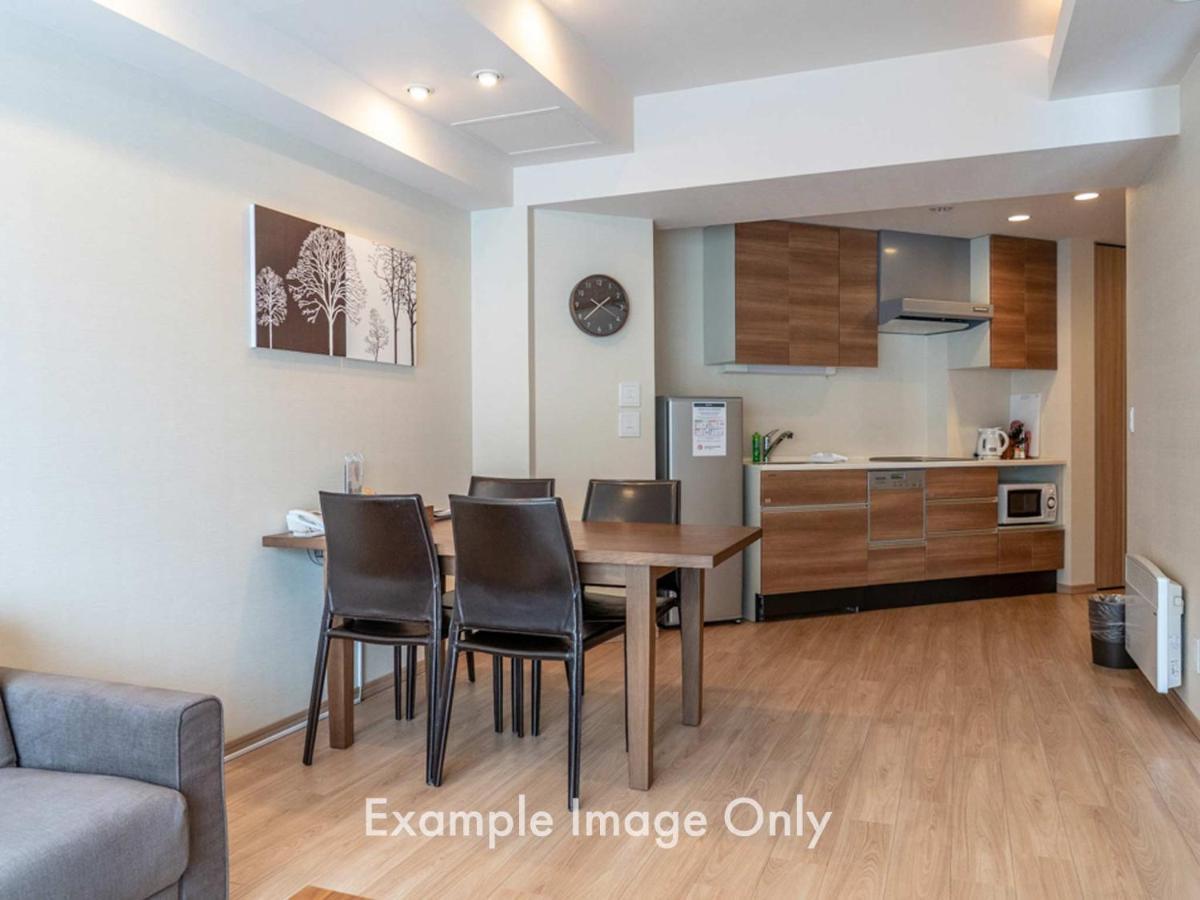Akazora Aparthotel Kucsan Szoba fotó