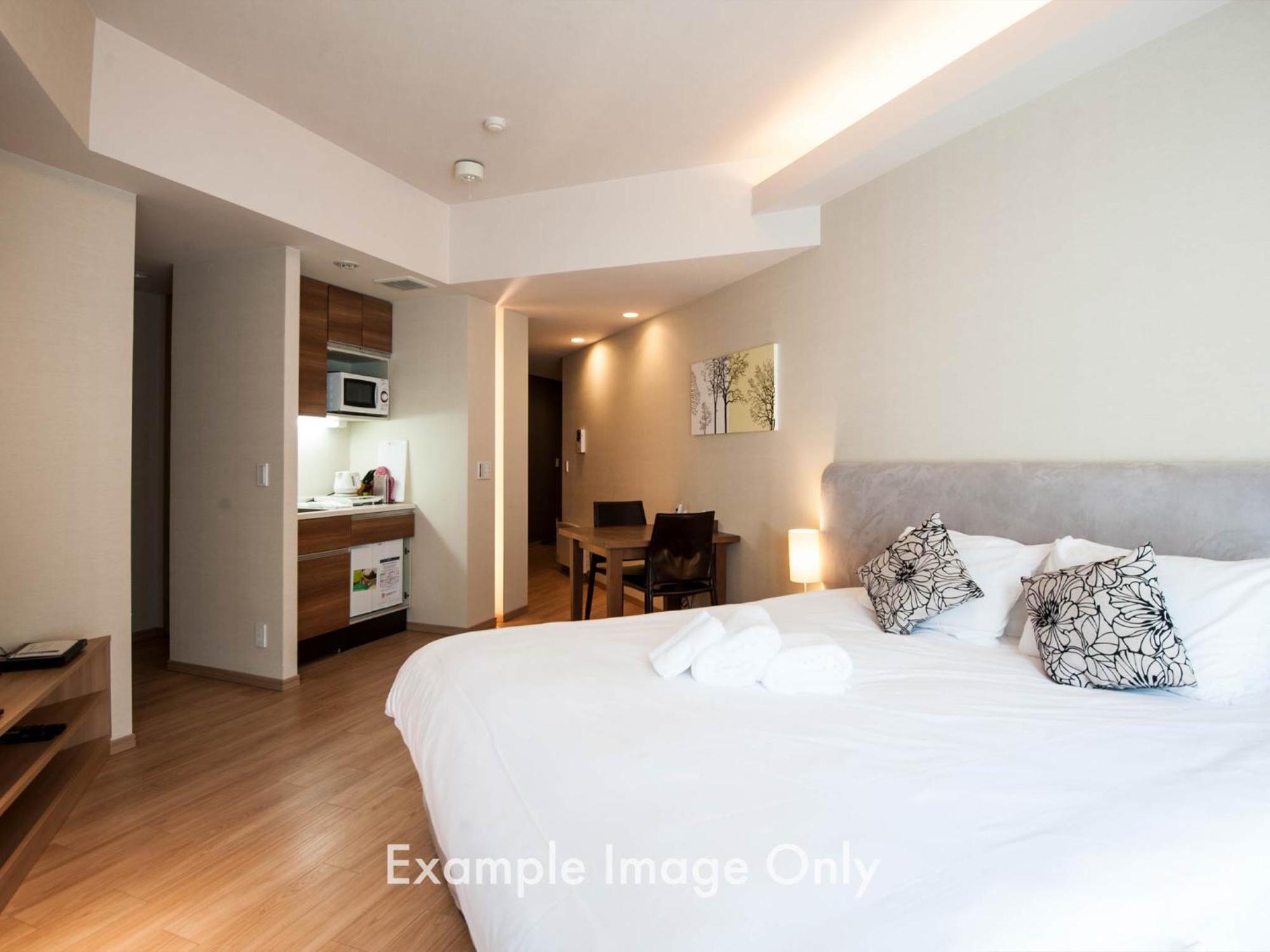 Akazora Aparthotel Kucsan Szoba fotó